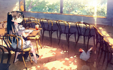 Chica sentada en un café